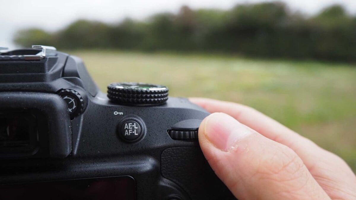 Nikon D3400 exposure compensation scroll wheel